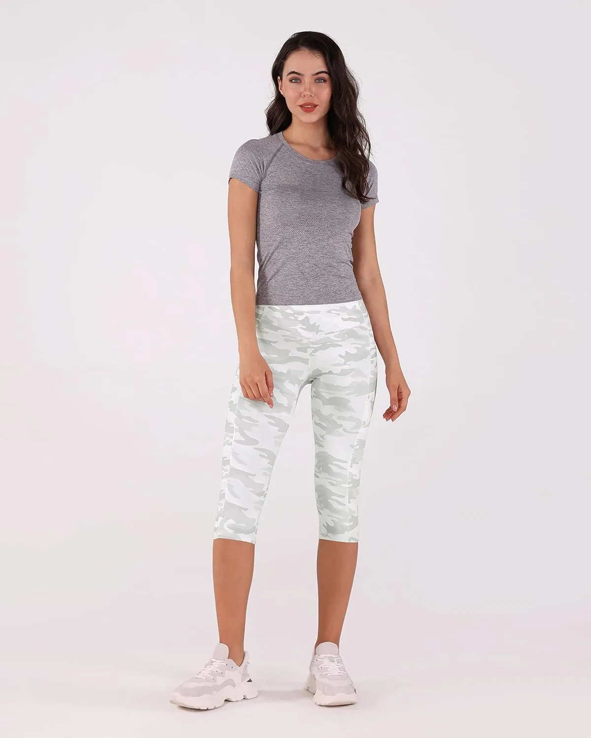 ODODOS Women's High Waisted Yoga Capris with Pockets, Tummy Control Non See Through Workout Athletic Running Capri Leggings