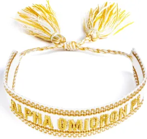 Sorority Shop Alpha Omicron Pi Bracelet — Woven Bracelet, White and Gold Design with AOP Sorority Name and Tassels, Greek Sorority Jewelry and Big Little Sorority Gifts